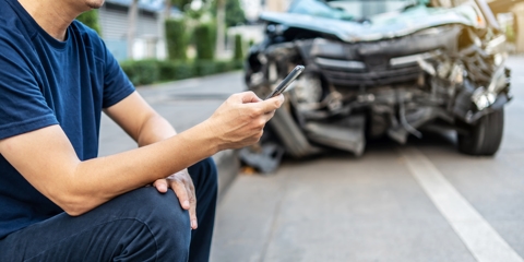Man on Phone After Car Accident