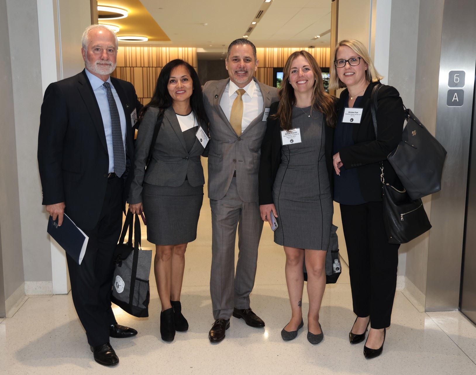 group of people in suits